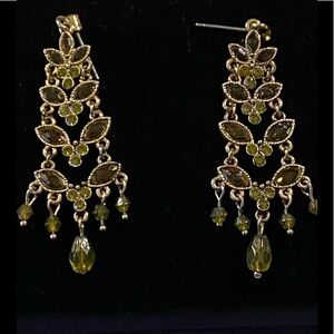 - Stunning gold tone and green stones pierced earring purchased in the 198…